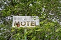 Methow, Washington - July 5, 2019: Old abandoned sign for the former Wagon Wheel Cafe and motel, closed for many years, along the Royalty Free Stock Photo