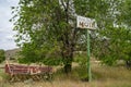 Methow, Washington -  Old abandoned sign for the former Wagon Wheel Cafe and motel, closed for many years, along the Royalty Free Stock Photo