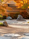 Meticulously raked sand patterns create a serene landscape in a Japanese Zen garden, complemented by vibrant autumn Royalty Free Stock Photo