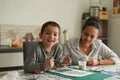 Metis mother doing painting with her son Royalty Free Stock Photo