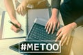 MeToo hashtag on workplace background. metoo as a new movement.
