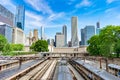 Metra and South Shore Trains at Van Buren Street Station with a City Skyline