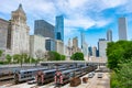 Metra and South Shore Trains at Van Buren Street Station with a City Skyline