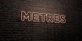 METRES -Realistic Neon Sign on Brick Wall background - 3D rendered royalty free stock image