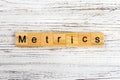 METRICS word made with wooden blocks concept Royalty Free Stock Photo