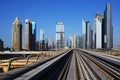 Metro on the background of skyscrapers of Dubai World Trade cent Royalty Free Stock Photo