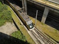 Metro do Porto train from above, arriving at Estadio do Dragao station