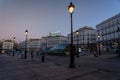 Metro entrance in Puerta del Sol square in the light of dawn in the Spanish capital.