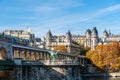 Metro with graffiti on Bir-Hakeim bridge in Autumn - Paris