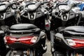 Metro Manila, Philippines - A batch of new scooters parked at a dealership lot.