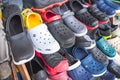 Metro Manila, Philippines - Counterfeit and knockoff Crocs foam clogs of different designs on display for sale at a Royalty Free Stock Photo