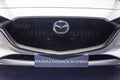 Metro Manila, Philippines - The front grill of a Mazda 3 fastback M Hybrid at the Philippine International Motor Show