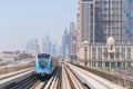 Metro railway and fully automated train in modern and luxury Dubai city, United Arab Emirates