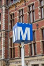 Metro sign at Amsterdam central station Royalty Free Stock Photo