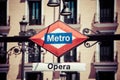 Metro Sign on blurred city, Madrid Royalty Free Stock Photo