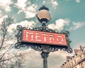 Metro sign for subway transportation in Paris, France Royalty Free Stock Photo