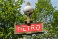 Metro subway entry sign in Paris