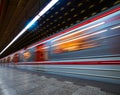 metro train in fast movement at station Royalty Free Stock Photo