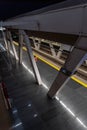 metrobus station at night with night light steel structure