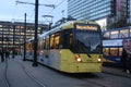 Metrolink tram leaving Piccadilly Gardens tram stop