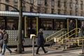 Metrolink Tram at St Peters Square Station. Public Transport Vehicle. Passengers in shot