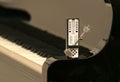 Metronome on a piano Royalty Free Stock Photo