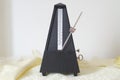 Metronome wobble on the piano Royalty Free Stock Photo