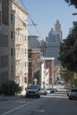 Downtown of San Francisco. Skyscrapers, modern architecture, cars, people walking