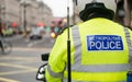 Metropolitan Police motorcycle riders escort a protest demonstration in central London, England. Royalty Free Stock Photo