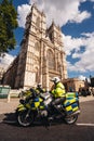 Metropolitan Police Officers on motorbikes waiting for Black Lives Matters crowd protesters to pass