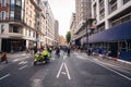 Metropolitan Police Officers on motorbikes waiting for Black Lives Matters crowd protesters to pass