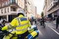 Metropolitan Police Officers on motorbikes waiting for Black Lives Matters crowd protesters to pass