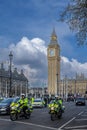 Metropolitan Police Service officers gurad on duty the Big Ben clock tower.It one of the most prominent symbols of London and the