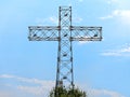 Mettallic cross top of cengio mountaiun in Veneto Italy