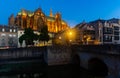 Metz cityscape at nigh with illuminated Cathedral on bank of Moselle River