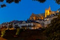 Metz cityscape at nigh with illuminated Cathedral on bank of Moselle River