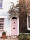 Colourful house with a pink door in Notting Hill in London