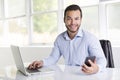 Mexican attractive businessman on his 30s working at modern home office with computer laptop Royalty Free Stock Photo