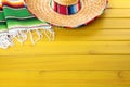 Mexico, Mexican sombrero blanket, wood background copy space Royalty Free Stock Photo