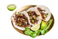 Mexican Beef Barbacoa Tacos with Cilantro and Onion. Isolated on white background. Top view.