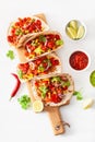 Mexican beef and pork tacos with salsa, guacamole and vegetables Royalty Free Stock Photo