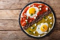 Mexican breakfast: eggs huevos divorciados with beans Frijoles r