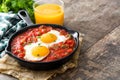 Mexican breakfast: Huevos rancheros in iron frying pan Royalty Free Stock Photo