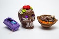 Mexican Calaverita de azucar , and Mole con Pollo and Coffin candy