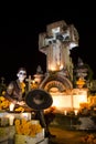 Mexican Catrina and Catrin at a cementery