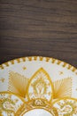 Mexican charro hat on wooden table. Mariachi hat.