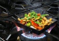 Mexican chicken fajitas on sizzling plate Royalty Free Stock Photo