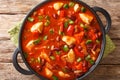 Mexican chicken with red beans in spicy chili sauce close-up in a pan. horizontall top view Royalty Free Stock Photo