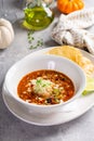 Mexican chicken soup topped with cotija cheese