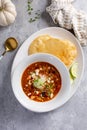 Mexican chicken soup topped with cotija cheese